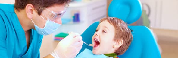 small kid patient visiting specialist in dental clinic
